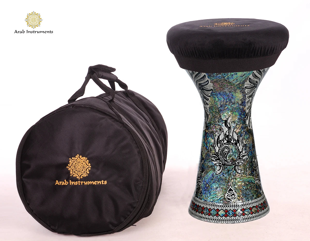 Front view of Guardian of Karnak professional darbuka drum with handcrafted owl engraving and shimmering blue pearl body