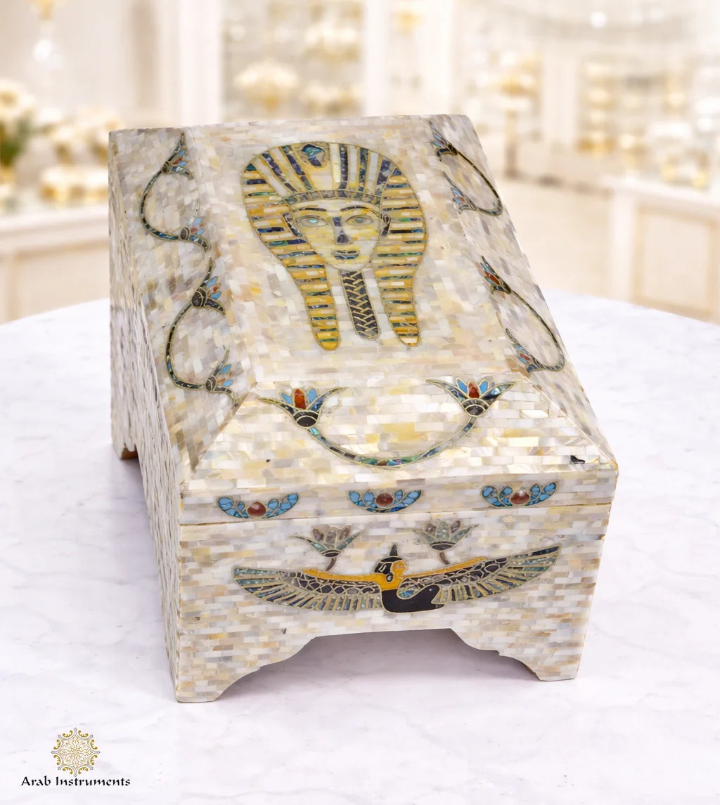 Open Egyptian mother-of-pearl jewelry box with lined interior compartments